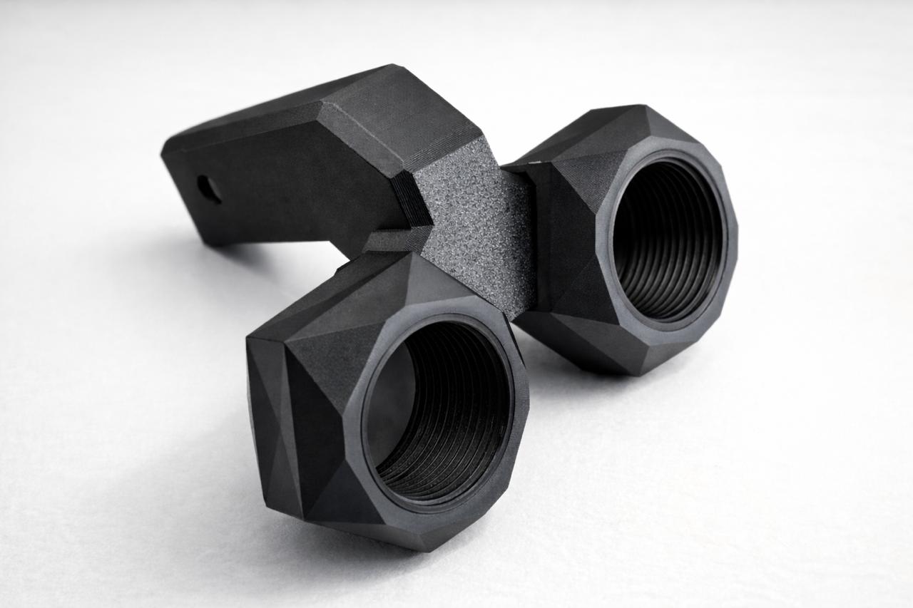 Big Nutz — side view, matte black hex nut with threading detail visible
