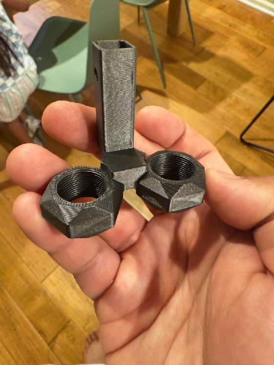 Hand holding finished Big Nutz prototypes